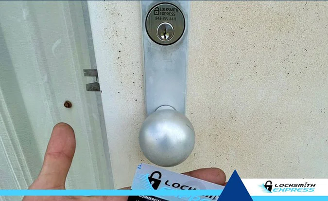 locksmith working rekey door lock