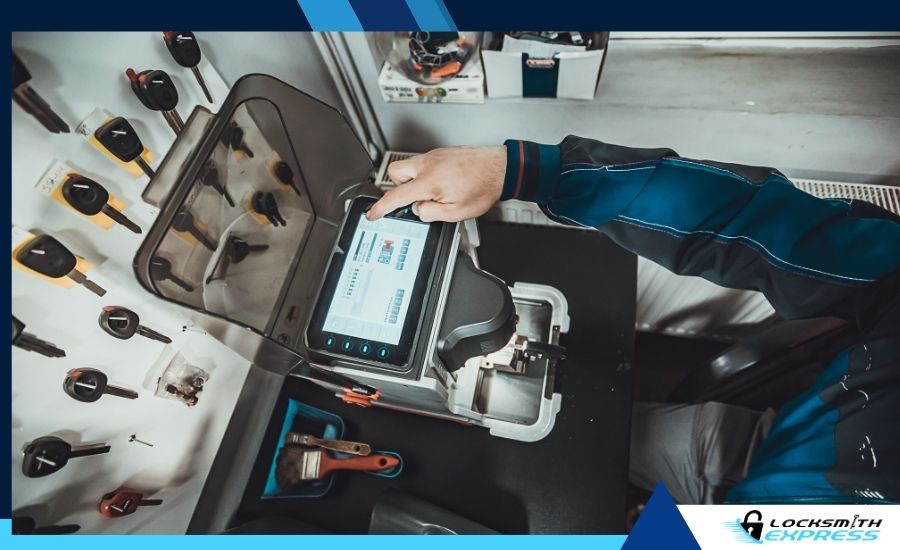 Professional locksmith using an OBD-II programming device on a car